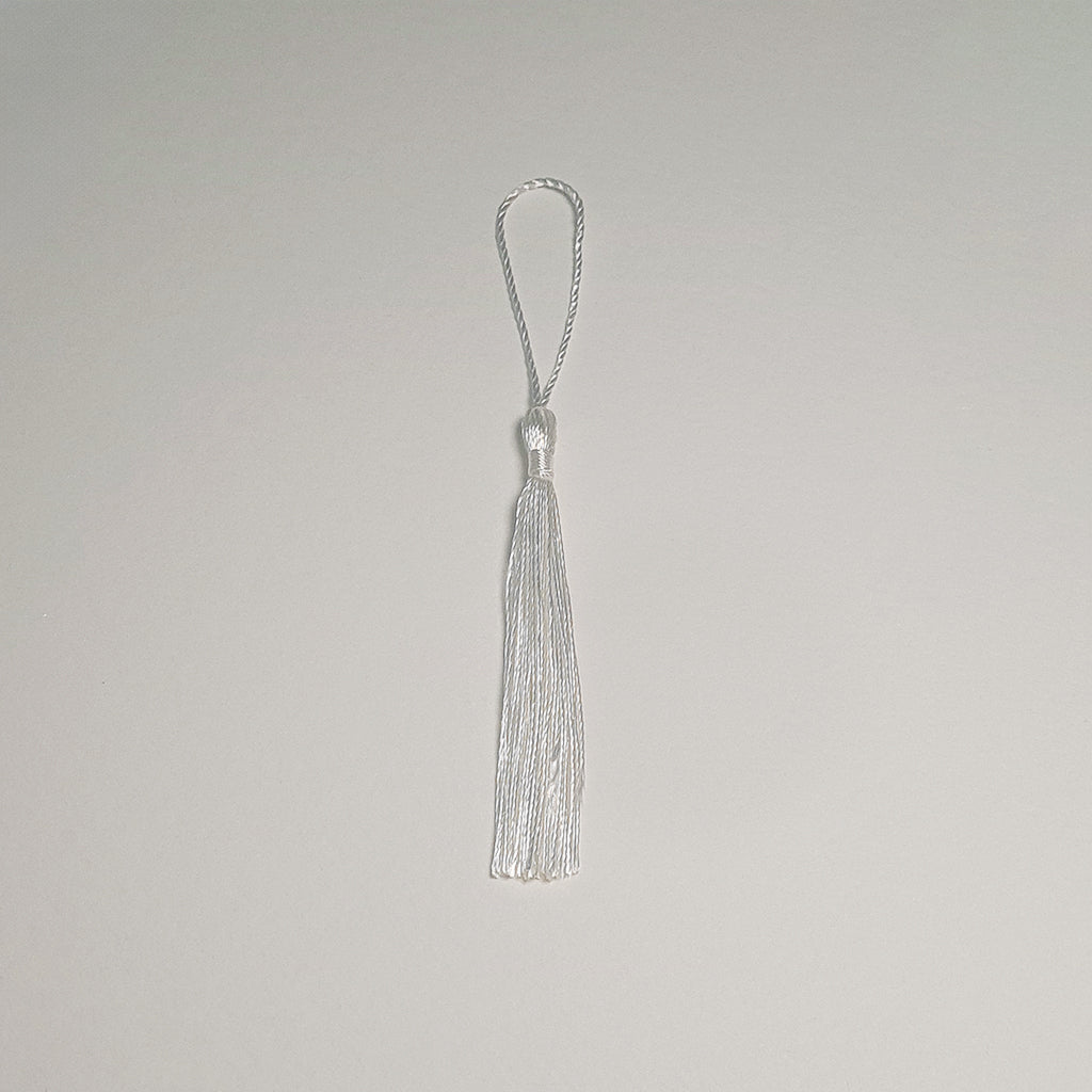 White Tassles