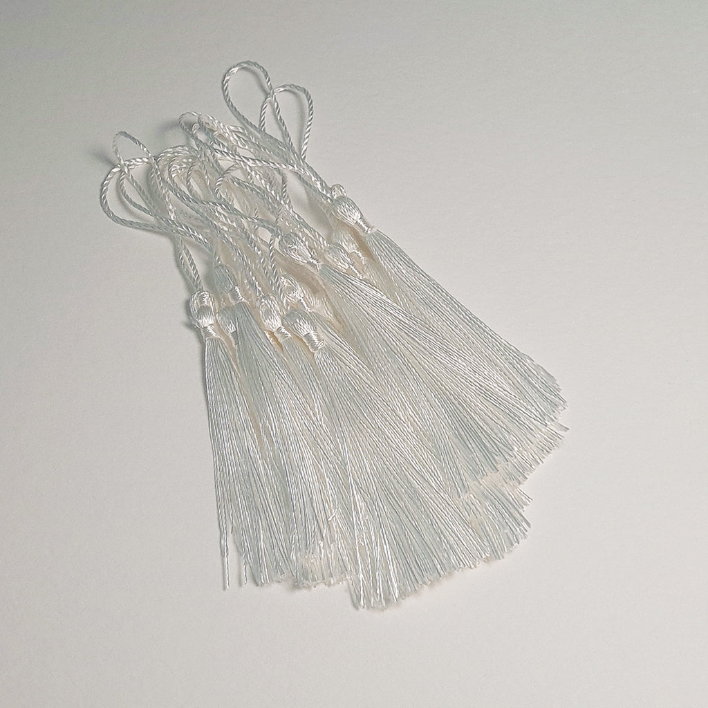 White Tassles