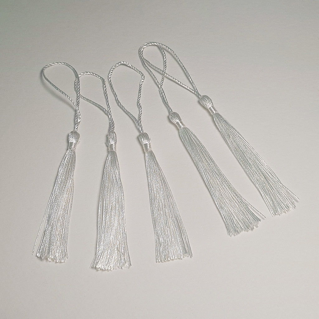 White Tassles